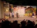 cast running off stage
